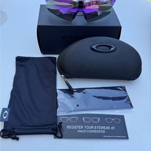 Oakley Sunglasses with Purple Lenses and Black Case